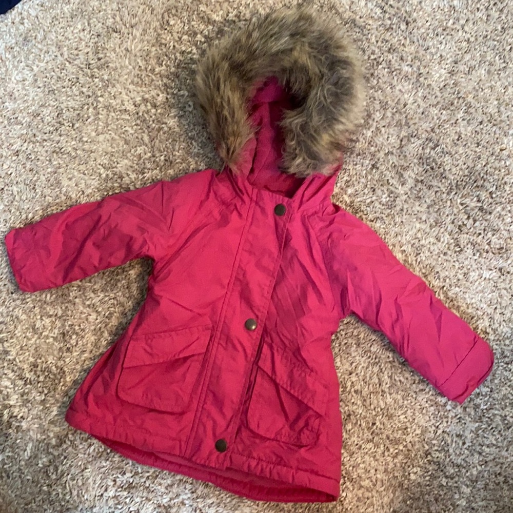Pink hooded jacket with fur lined hood